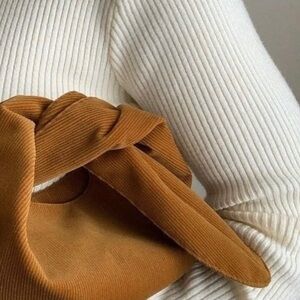 Merit Beauty signature corduroy bag